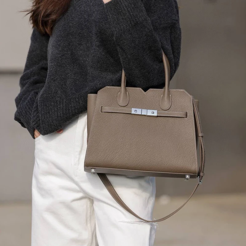 Professional androgynous structured leather tote with clean architectural lines