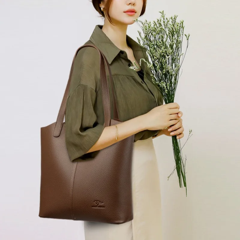Various neutral-colored work bags arranged to showcase professional color coordination options