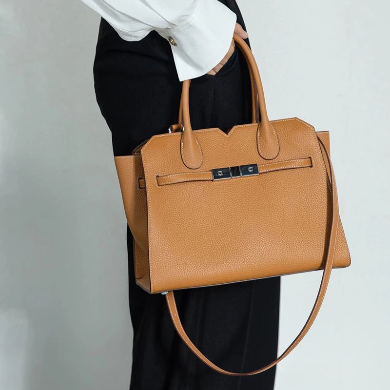 Professional tan leather work tote demonstrating versatility for various occasions