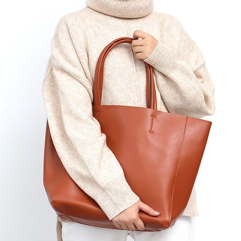 Professional techniques for addressing stains and damage on leather work bags