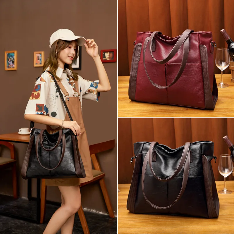 Soft leather women's work tote with secure compartments for tech protection