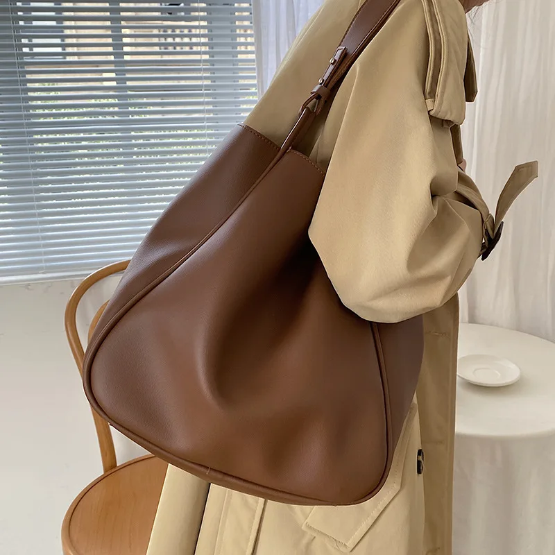 Interior layout of work tote showing multiple document compartments and organization system