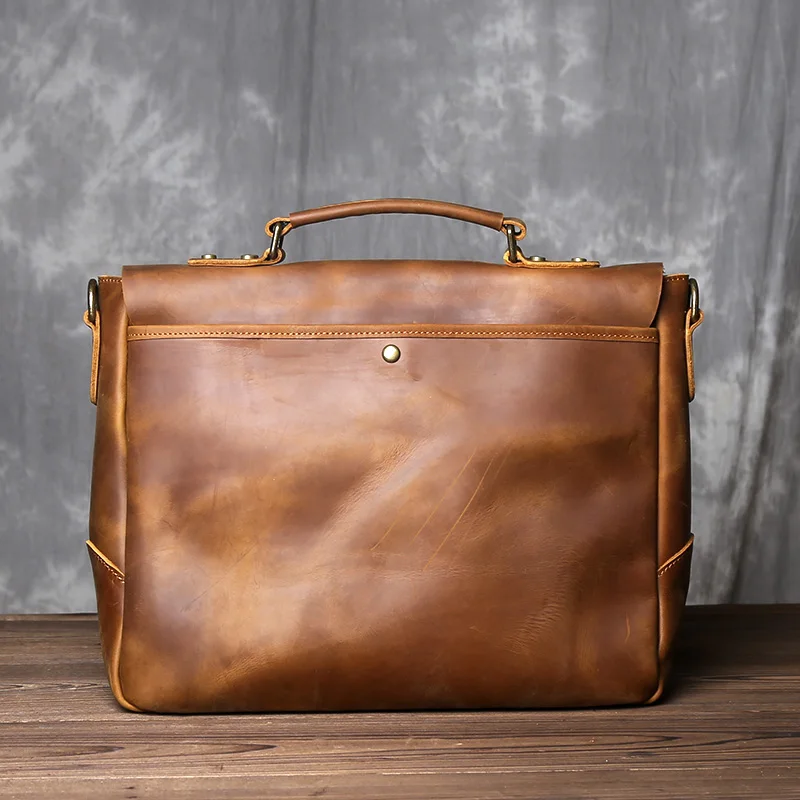 Comparative view of full grain and top grain leather construction in professional bags