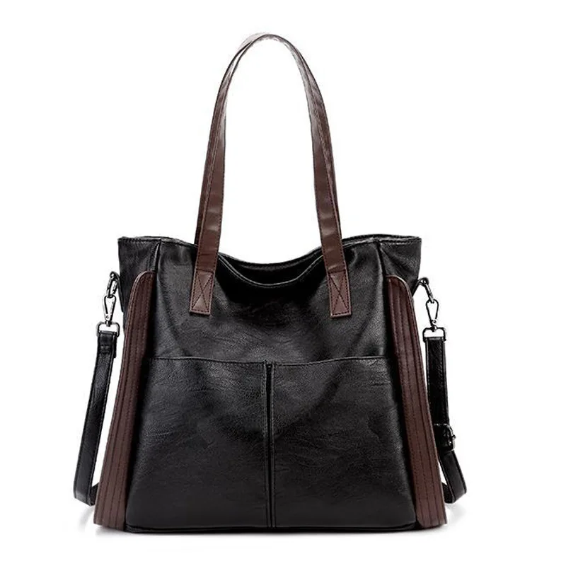 Modern professional leather tote with structured silhouette suitable for androgynous styling