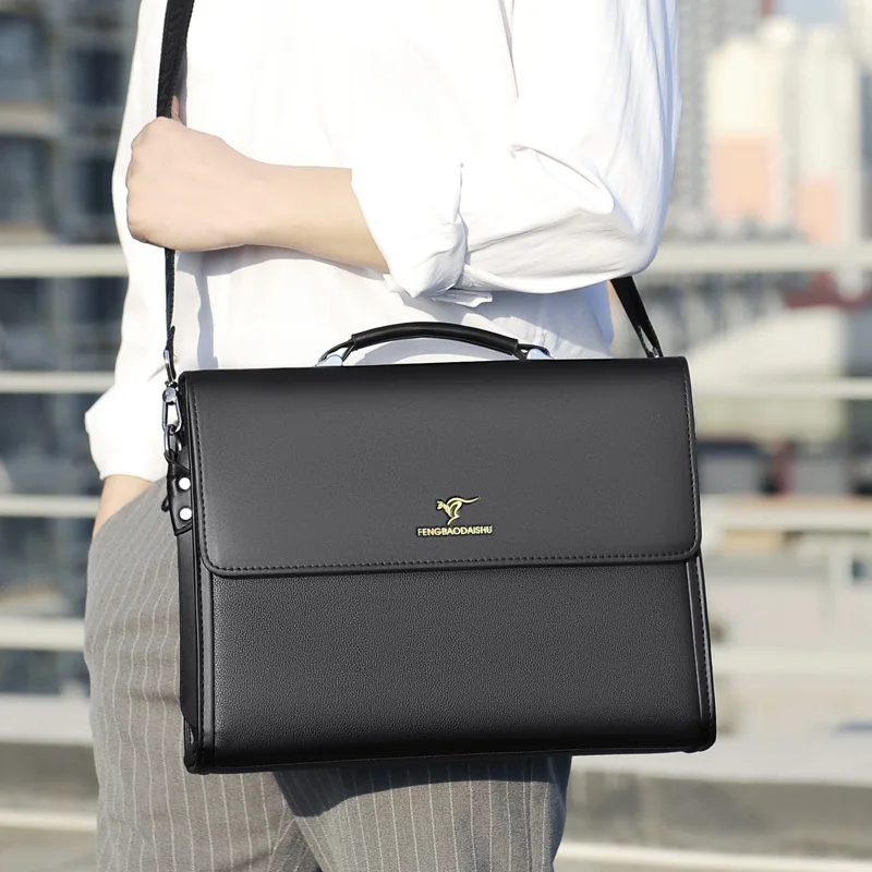 Professional examining the multiple document compartments in a premium leather briefcase