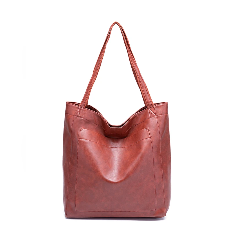 Casual outfit styled with a versatile leather tote for weekend errands