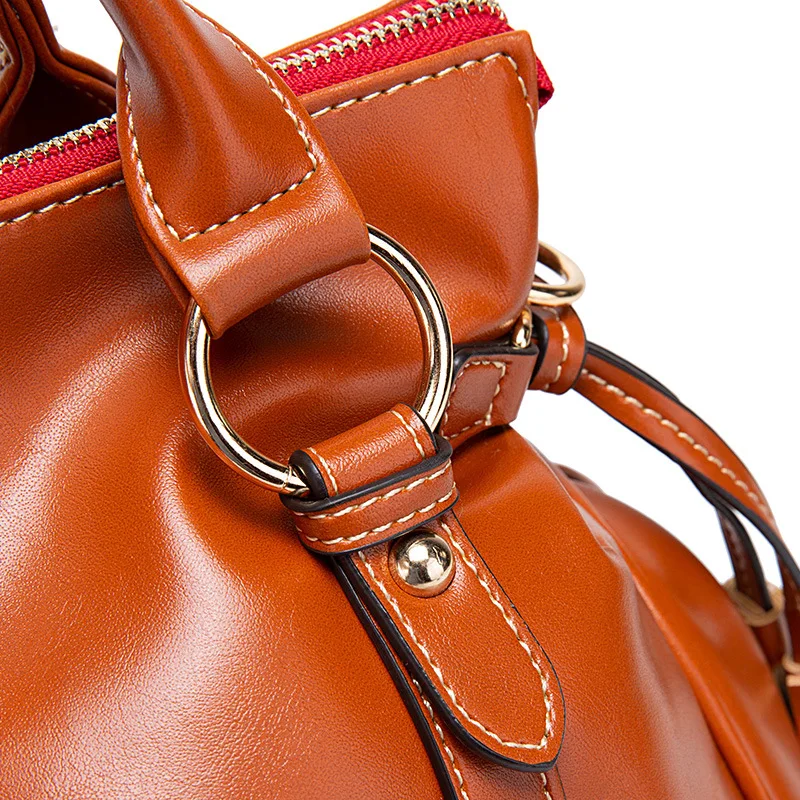 Elegant minimalist leather tote demonstrating sustainable fashion principles
