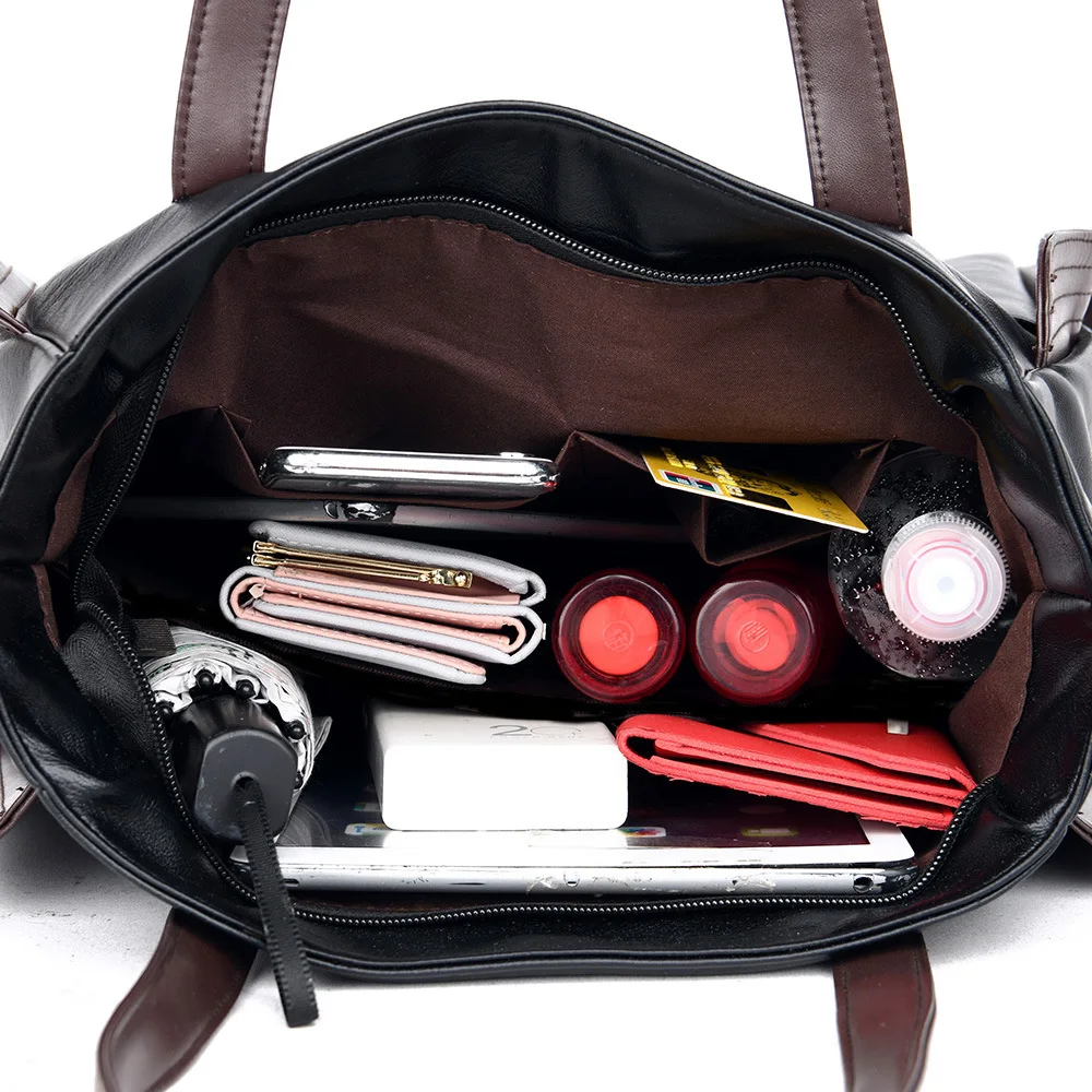 Women's leather tote with multiple organized compartments for professional use