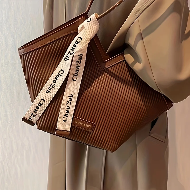 Various leather laptop bag styles showcasing different professional designs