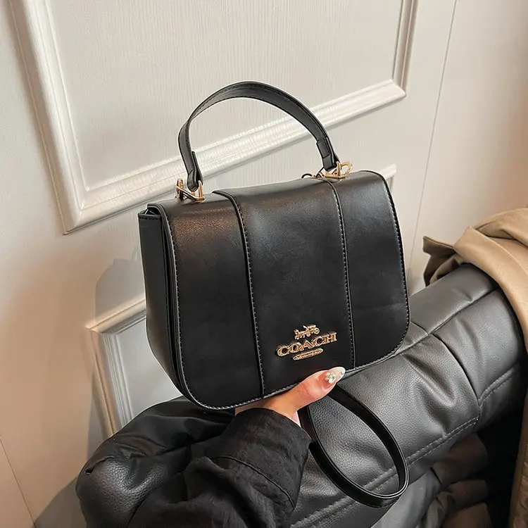 Waterproof vegan leather work tote showing multiple compartments for professional organization