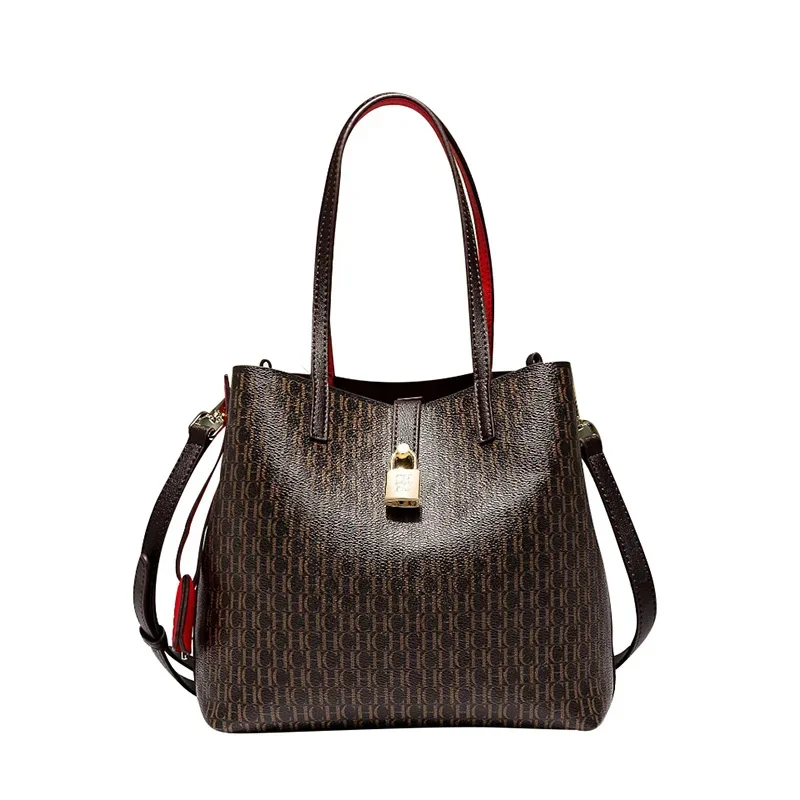 Professional woman coordinating a leather crossbody with business attire
