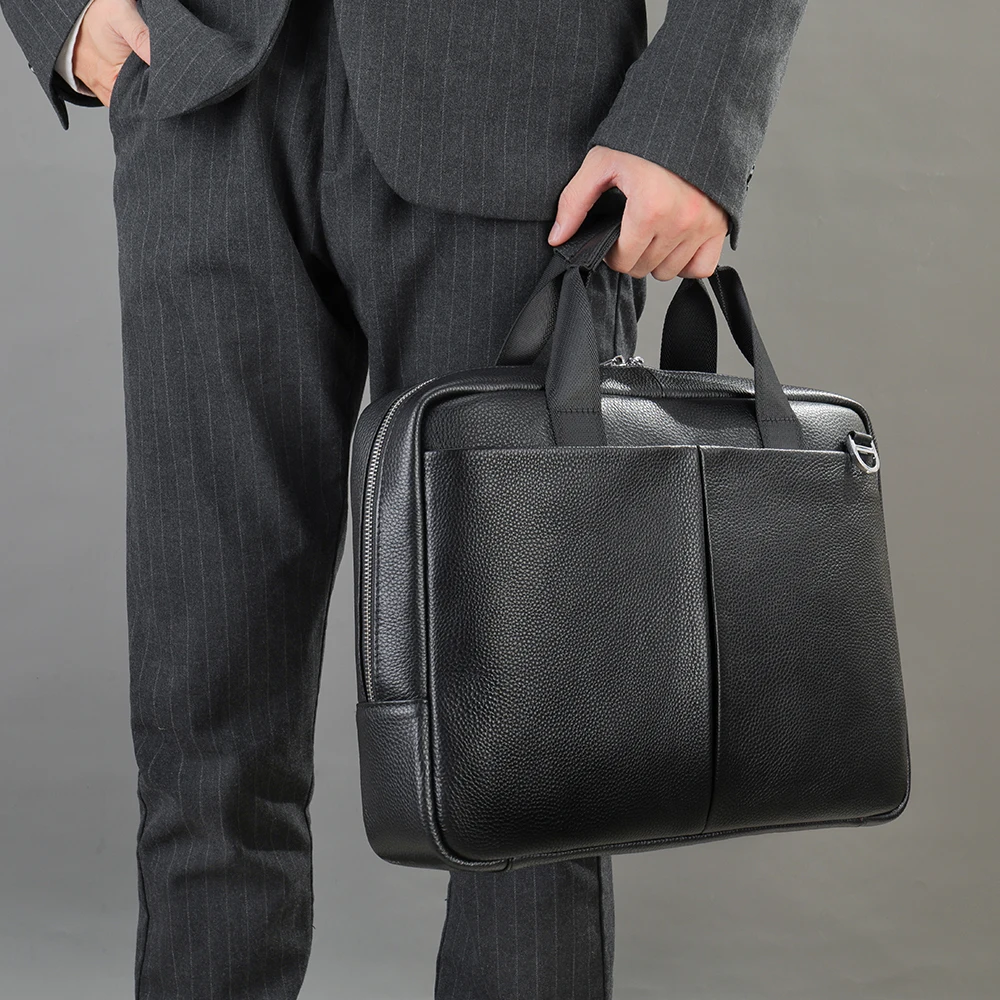 Executive leather briefcase with padded 15-inch laptop compartment and professional styling
