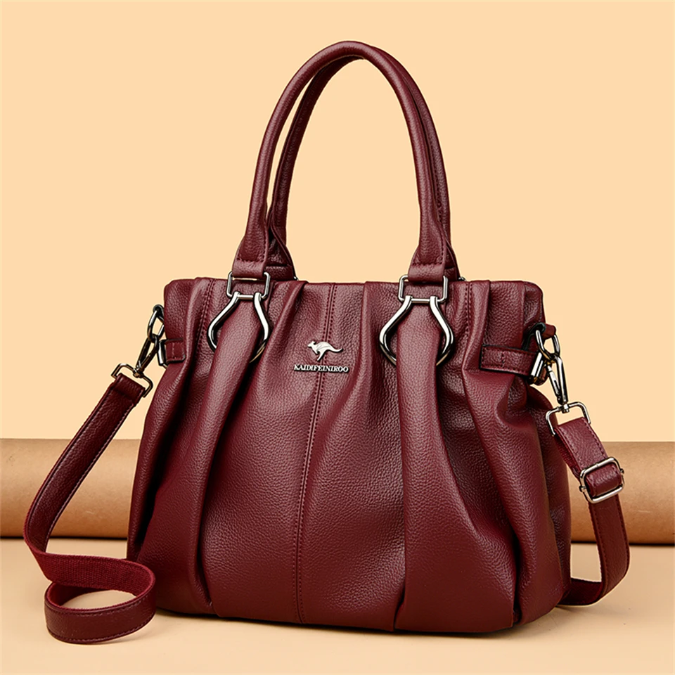 Elegant tan leather tote with professional organization for workplace essentials